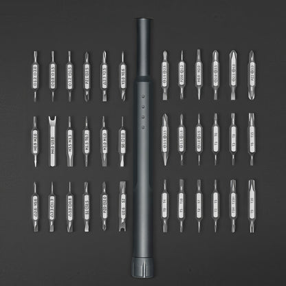 The Curious Mind 36-in-1 magnetic precision screwdriver set with multiple bits for electronics and small repairs.