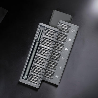 The Curious Mind 36-in-1 magnetic precision screwdriver set in grey, featuring various bits for electronics and small repairs.