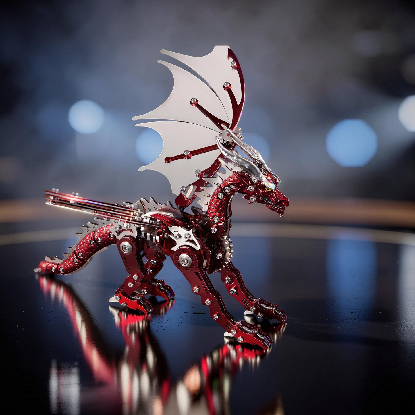 The Curious Mind Pterosaur DIY Kit: a metallic red and silver mechanical dragon model with white wings, intricate gears, and articulated limbs.