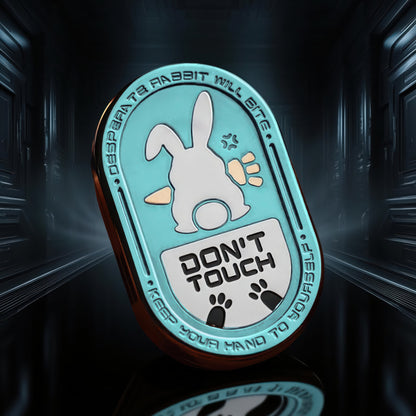 The Curious Mind Don't Touch Rabbit Slider fidget toy with a blue and white design featuring a rabbit and paw prints.