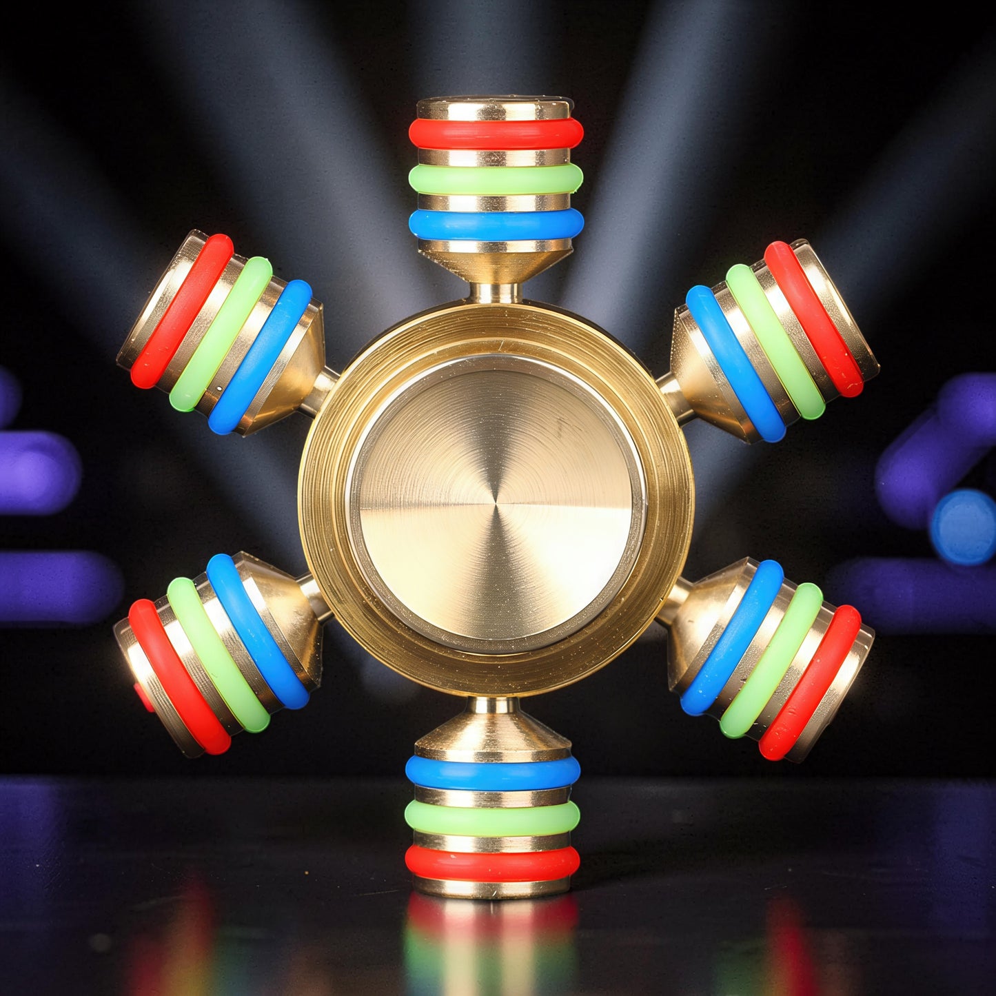 The Curious Mind Rainbow Metal Hand Spinner with red, green, and blue rings on each arm. Premium EDC fidget toy.