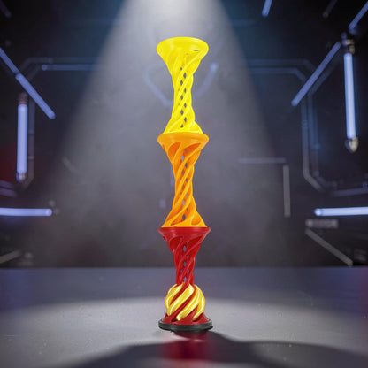The Curious Mind Rainbow Spiral Ejection Ball fidget toy, made of PLA, features stacked twisted sections in yellow, orange, and red, with a spiral base.