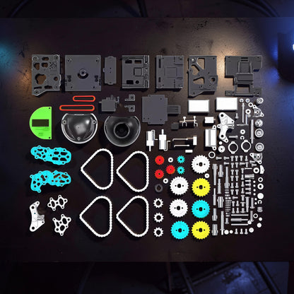 The Curious Mind RC Tank Robot DIY Kit with metal parts, gears, tracks, and green chassis components.