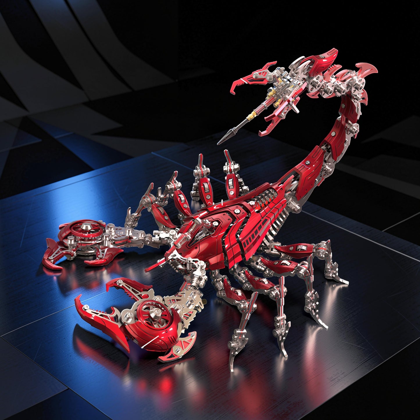 The Curious Mind's red and silver mechanical scorpion model kit, featuring intricate metal parts and a detailed design.
