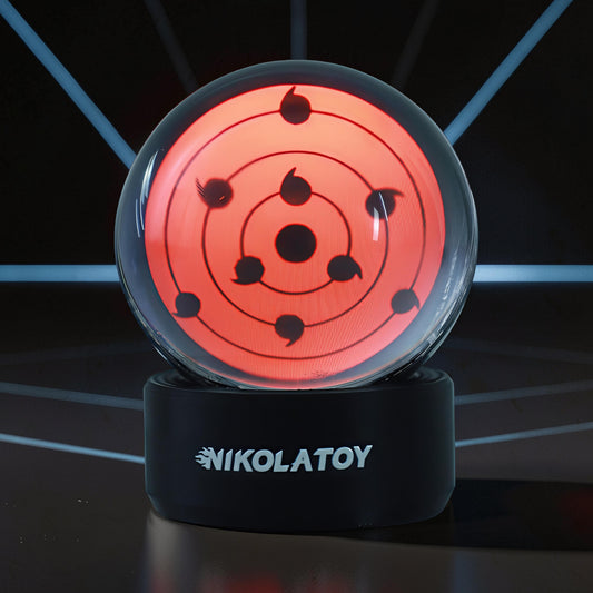 The Curious Mind Sharingan Crystal Ball Decorative Ornament, red and black, made of crystal resin, with a unique eye design.
