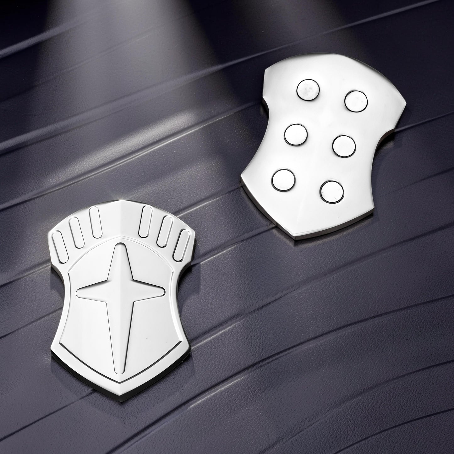 The Curious Mind Shield Fingertip Spinner, a compact EDC metal spinner with a shield design and tactile buttons.