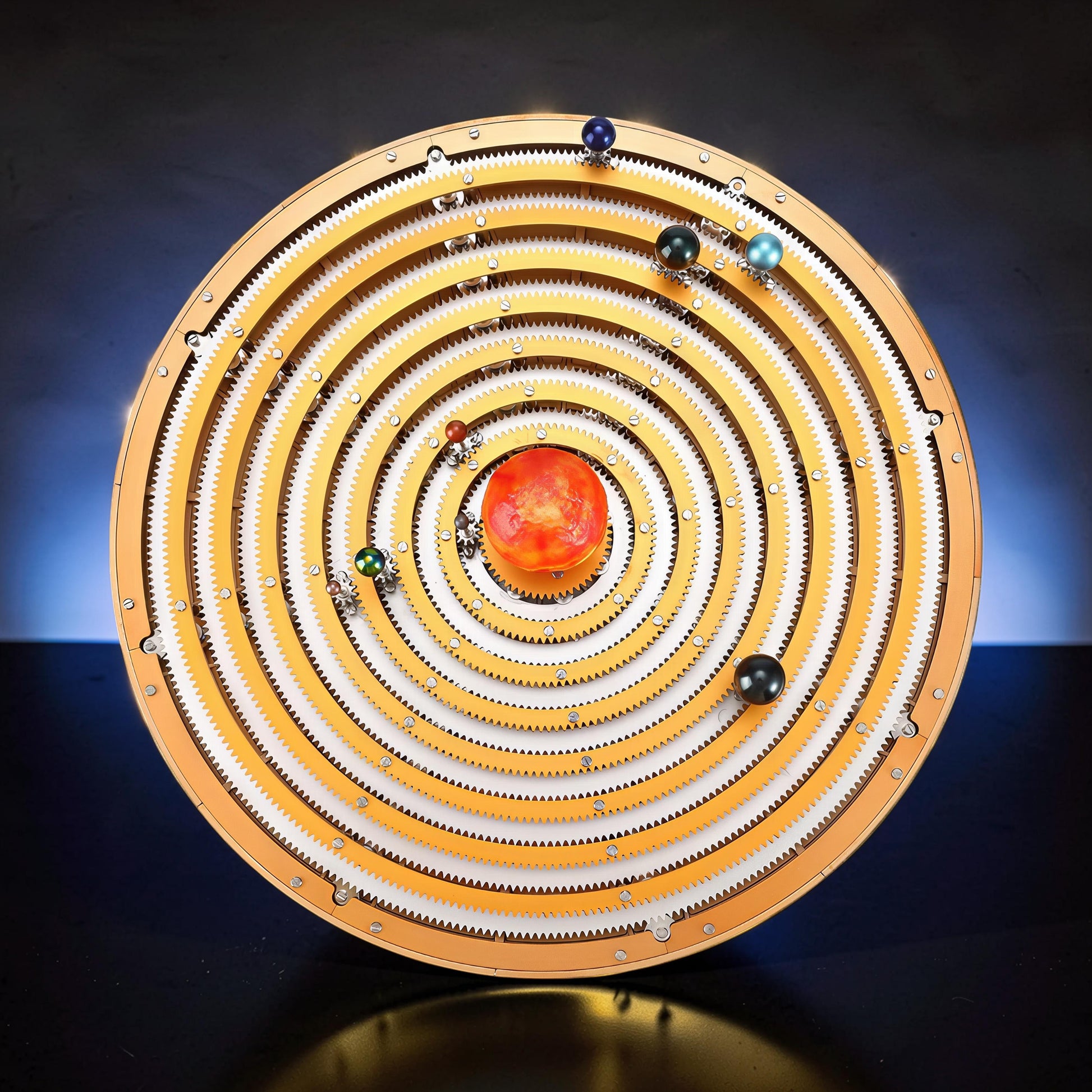 The Curious Mind Solar System DIY Kit features a metal mechanical model with a sun and planets on concentric gears.