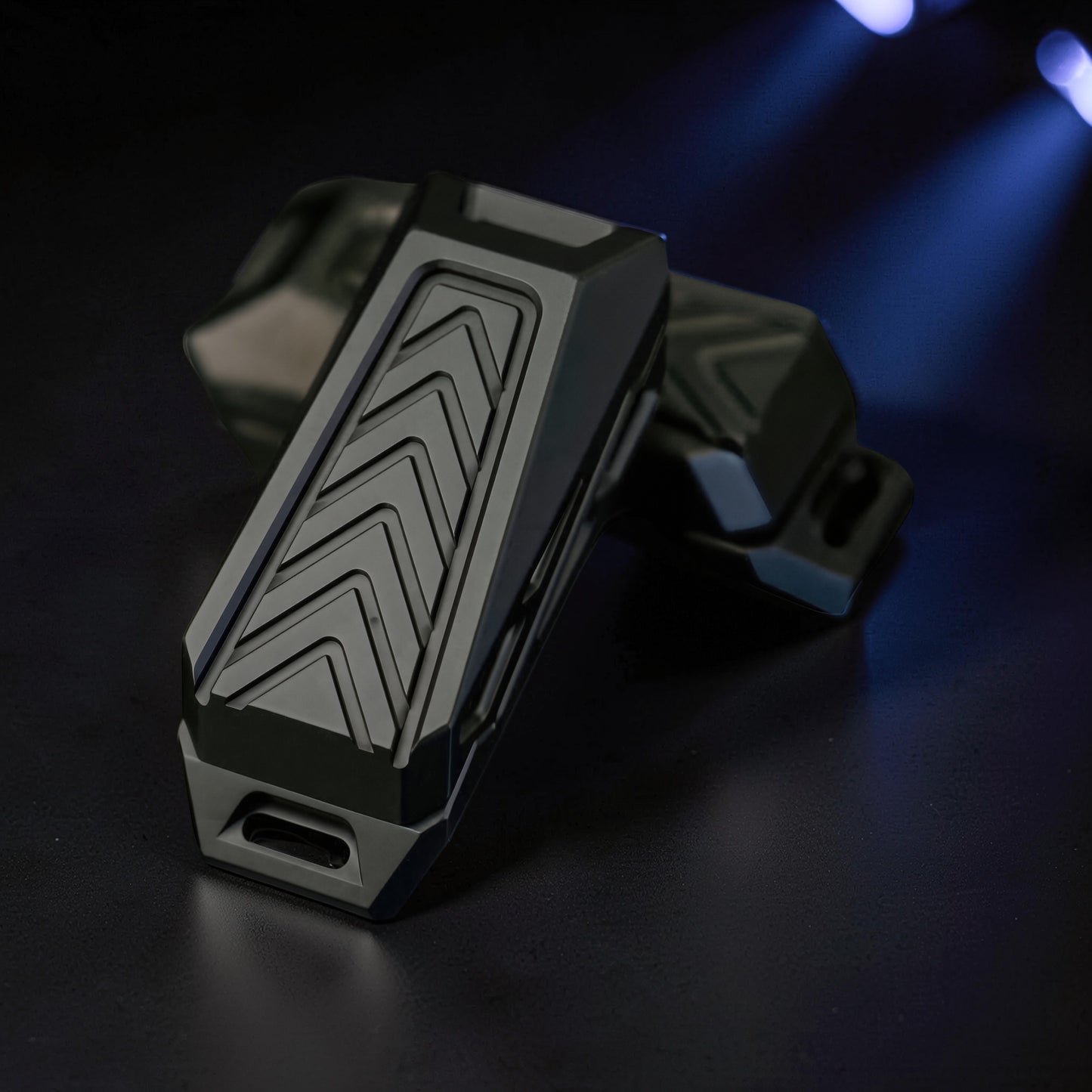 The Curious Mind Stainless Steel Chevron Slider fidget toy with chevron pattern. Compact metal push-and-return slider for stress relief.