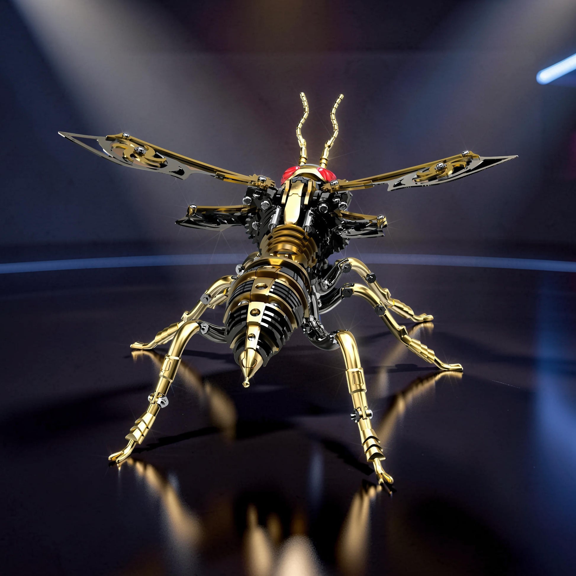 The Curious Mind Stainless Wasp 3D metal model kit, featuring intricate gold and silver metallic details and red eyes.