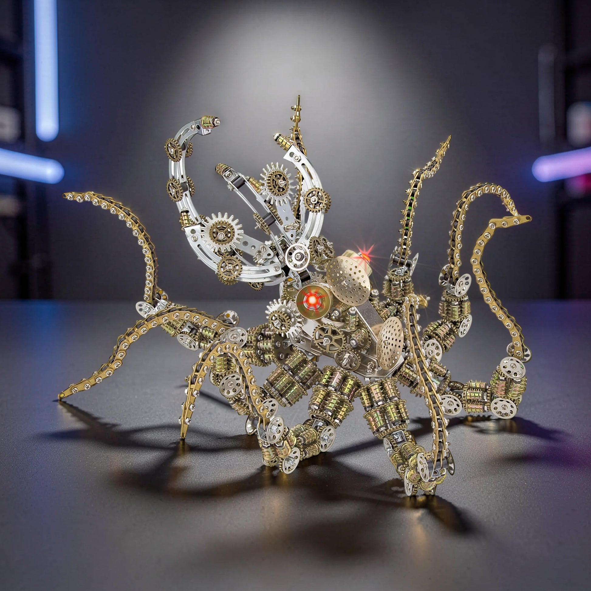 The Curious Mind Steampunk Octopus metal model kit with intricate gears and colourful LED lights, featuring a detailed mechanical design.