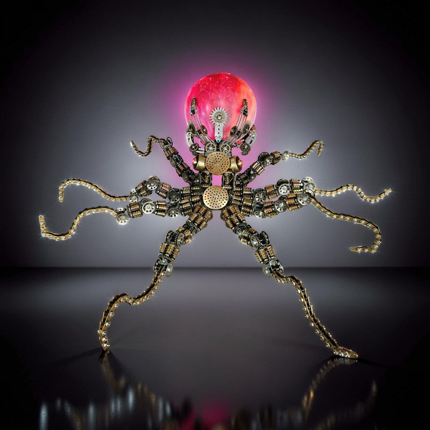 The Curious Mind Steampunk Octopus metal model kit with colourful lights and intricate gears. A unique desktop display piece.