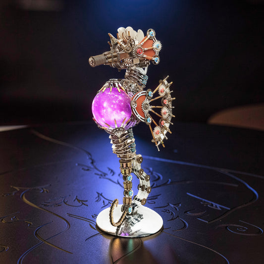 The Curious Mind Steampunk Seahorse model kit with a glowing purple orb and intricate metal gears. Features a lantern light.