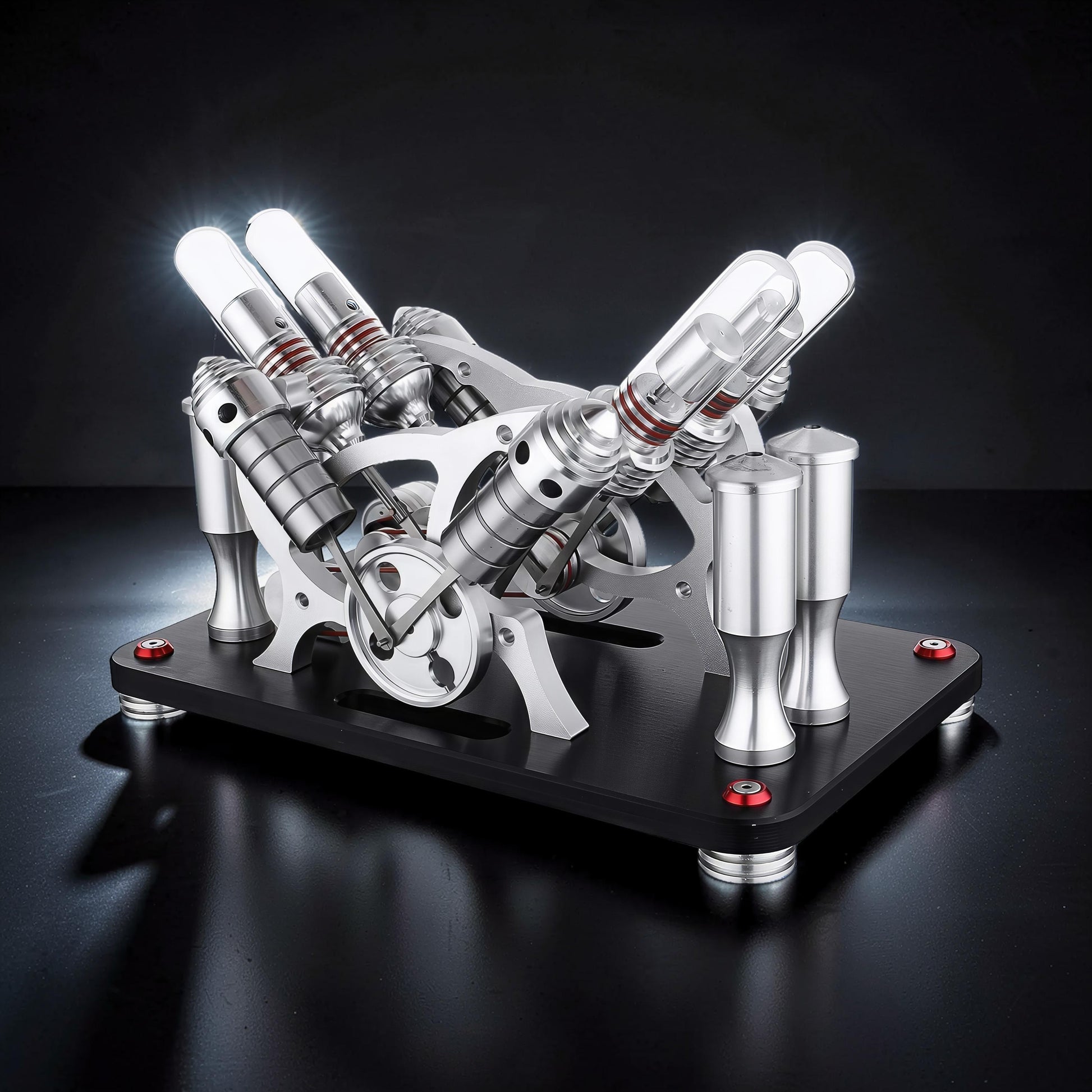 The Curious Mind Stirling Engine V4 Display Model, a metal mechanical model with V-twin cylinders and a rotating flywheel, ideal for desks and gifts.
