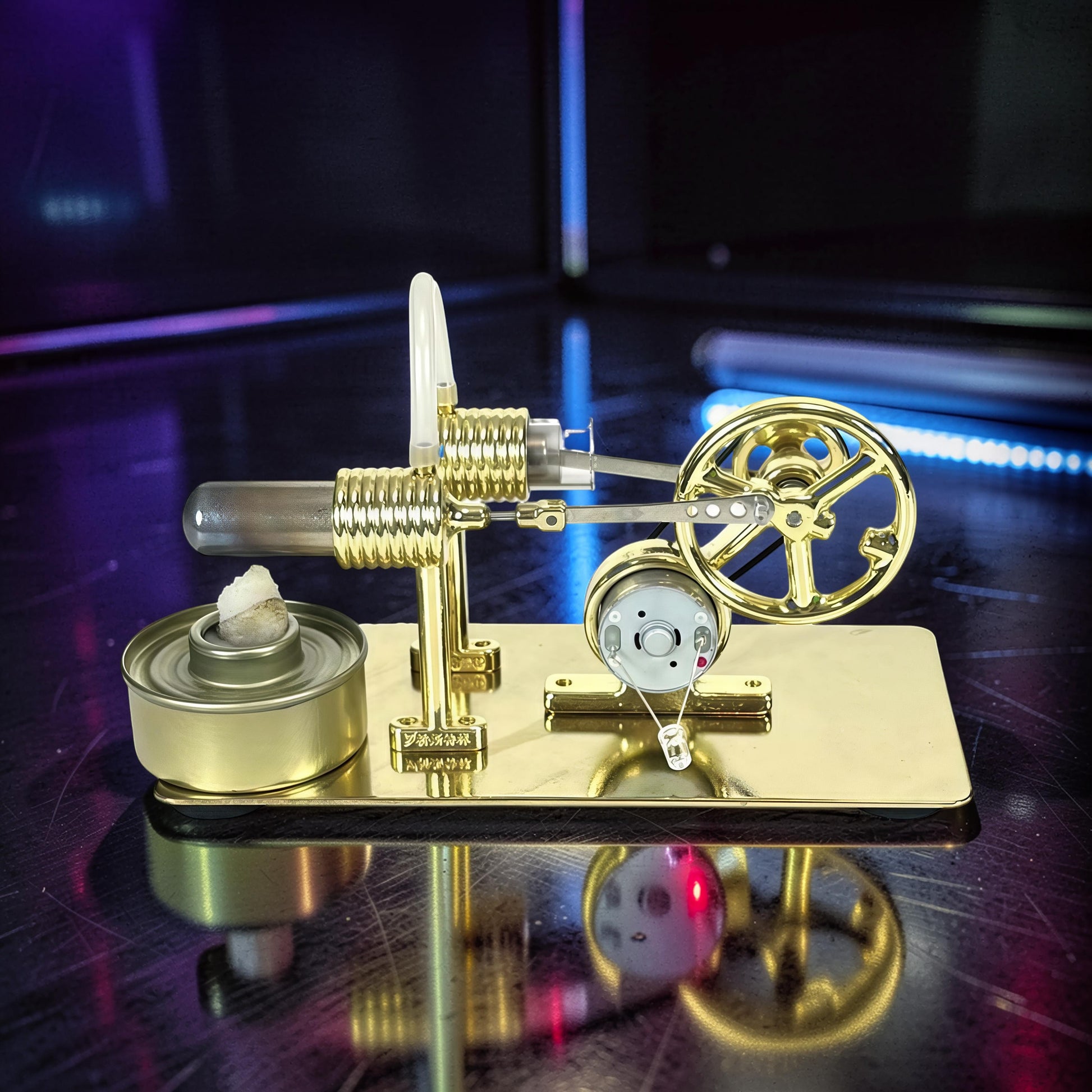 The Curious Mind Classic Stirling Engine DIY Kit, a polished gold metal model with a glass cylinder, flywheel, and fuel burner.