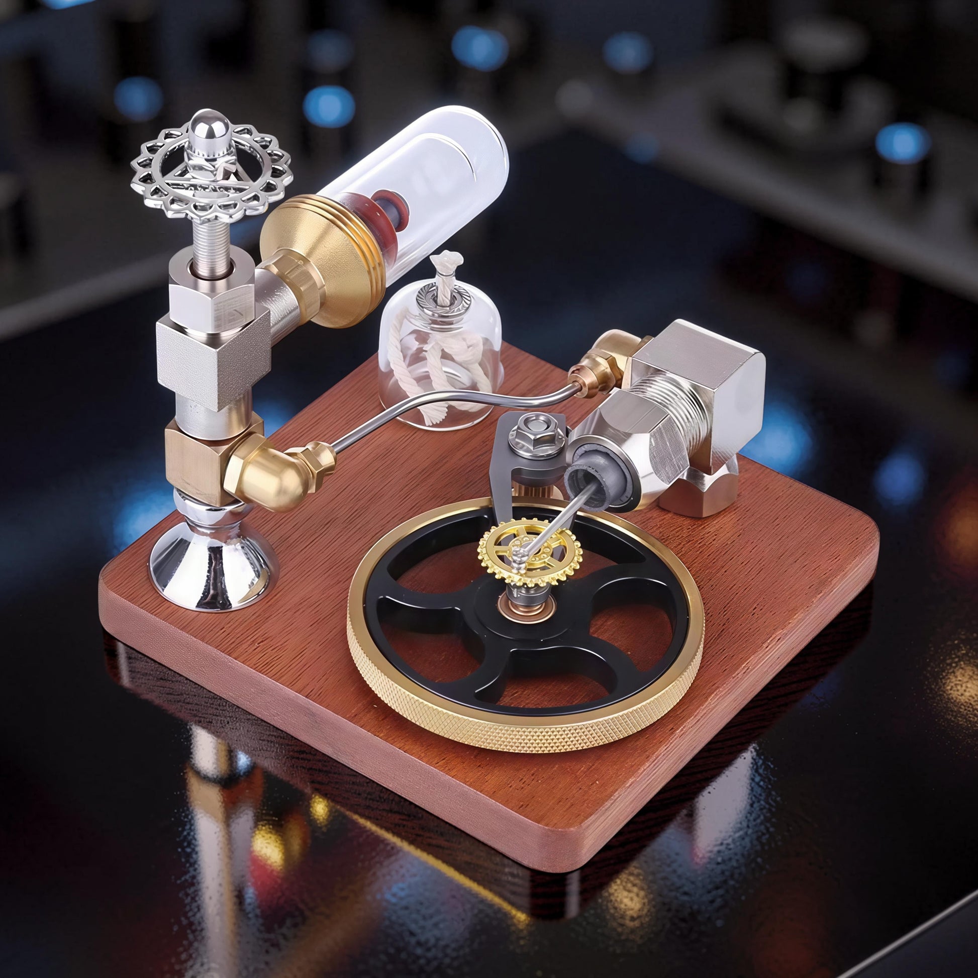 The Curious Mind Stirling Engine with adjustable speed controller, made of metal, wood, and quartz glass, featuring a flywheel and burner.