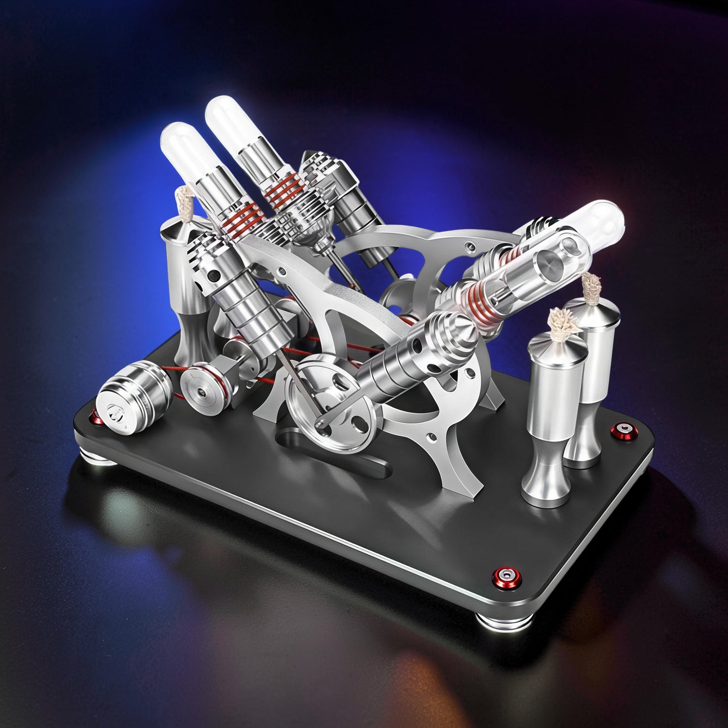 The Curious Mind Stirling Engine V4 Display Model, a metal mechanical model with multiple cylinders and pistons, red accents, and a black base.