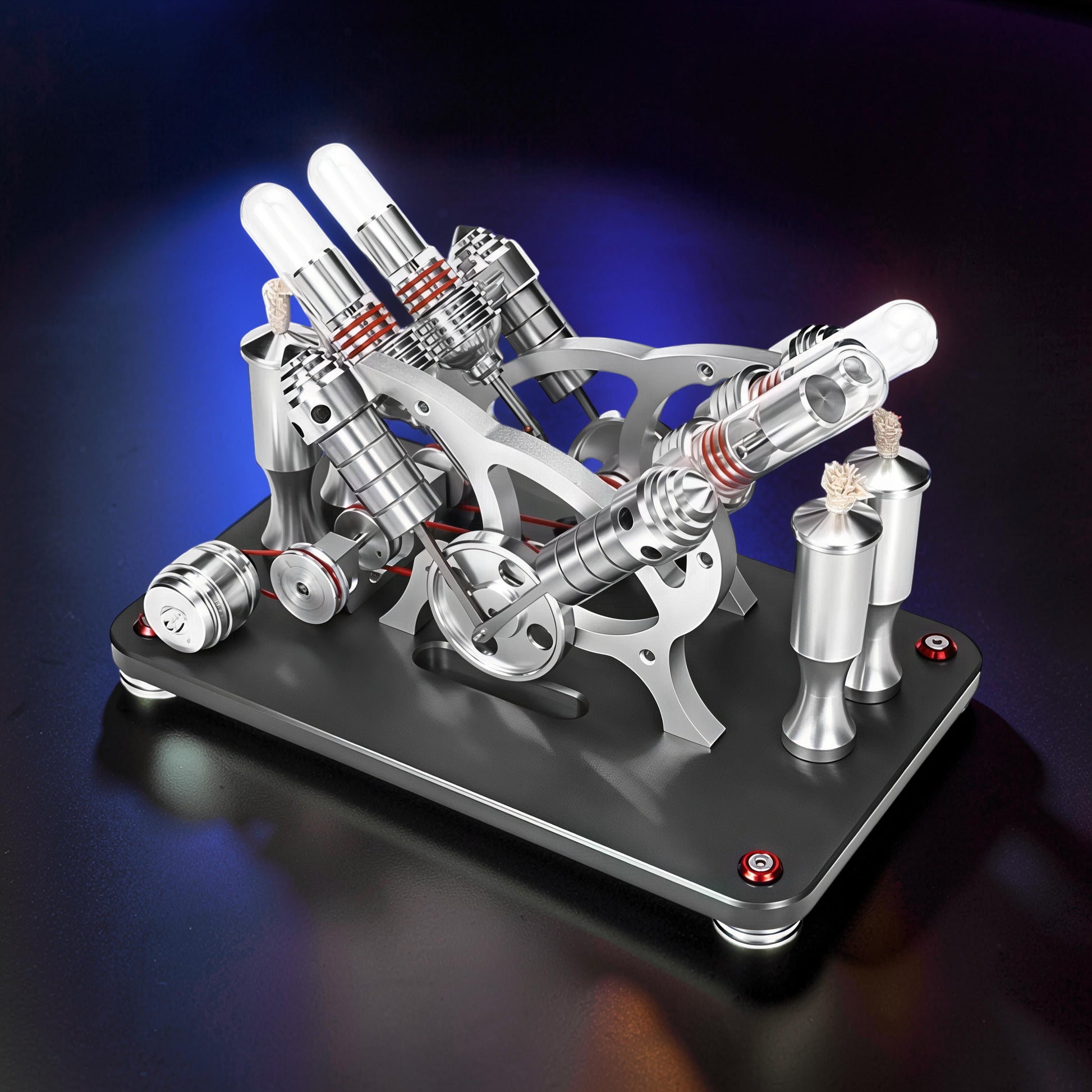 The Curious Mind Stirling Engine V4 Display Model, a metal mechanical model with multiple cylinders and pistons, red accents, and a black base.
