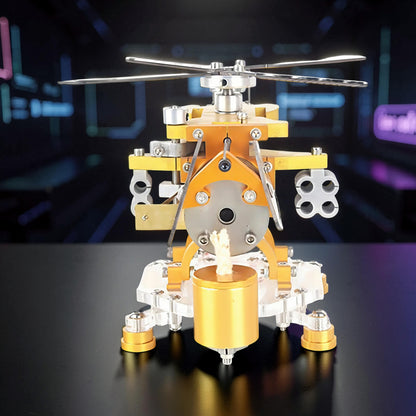 The Curious Mind Fire-Absorbing Stirling Helicopter Model, a metal engine display with orange and silver accents, featuring spinning blades and a visible flame.
