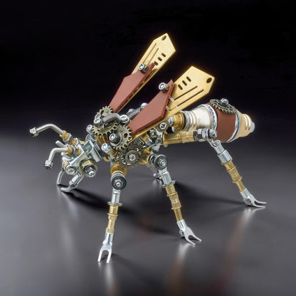 The Curious Mind Termite 3D metal model kit with brass wings, leather accents, and intricate gears. Steampunk insect sculpture.