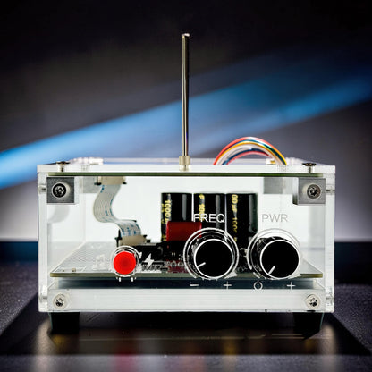 The Curious Mind Tesla Coil TC10 Plus pocket palm lightning plasma lamp with clear acrylic case, two knobs, red button, and internal components.