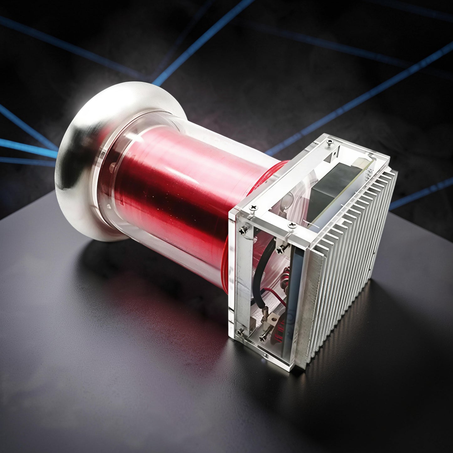The Curious Mind Tesla Coil TC20 Plasma Science Lamp with red coil inside a clear cylinder and metal base.