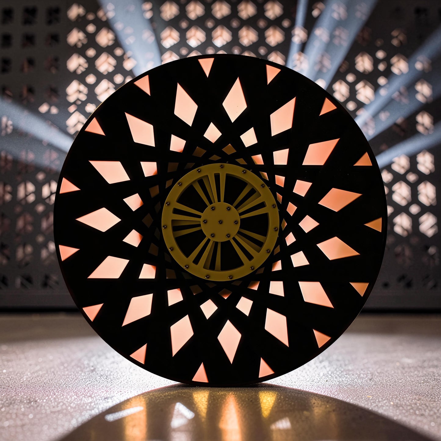 The Curious Mind Time Travel Edition desktop ornament, black PLA with a yellow gear detail and illuminated geometric cutouts.
