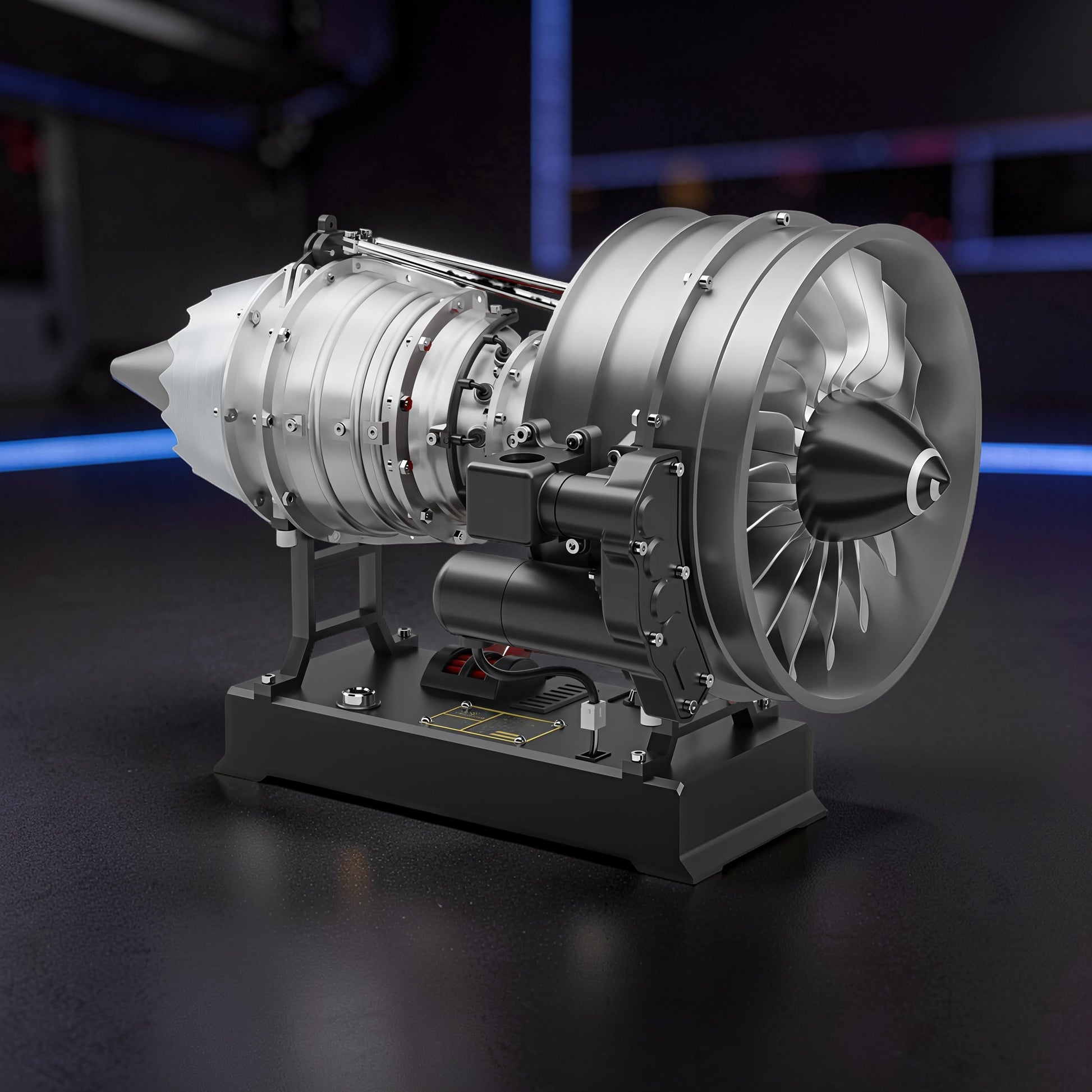 The Curious Mind Medium Turbofan Engine DIY Kit model, a detailed replica with silver and black components on a black display stand.