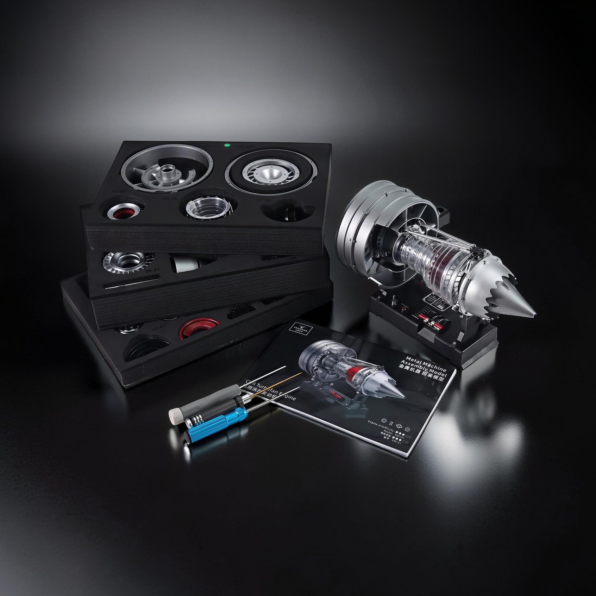 The Curious Mind Medium Turbofan Engine DIY Kit, a metal and clear plastic assembly model with detailed components and instructions.
