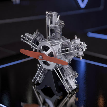 The Curious Mind 5-cylinder aircraft radial engine mechanical model kit, made of metal, with a brown propeller and black stand.