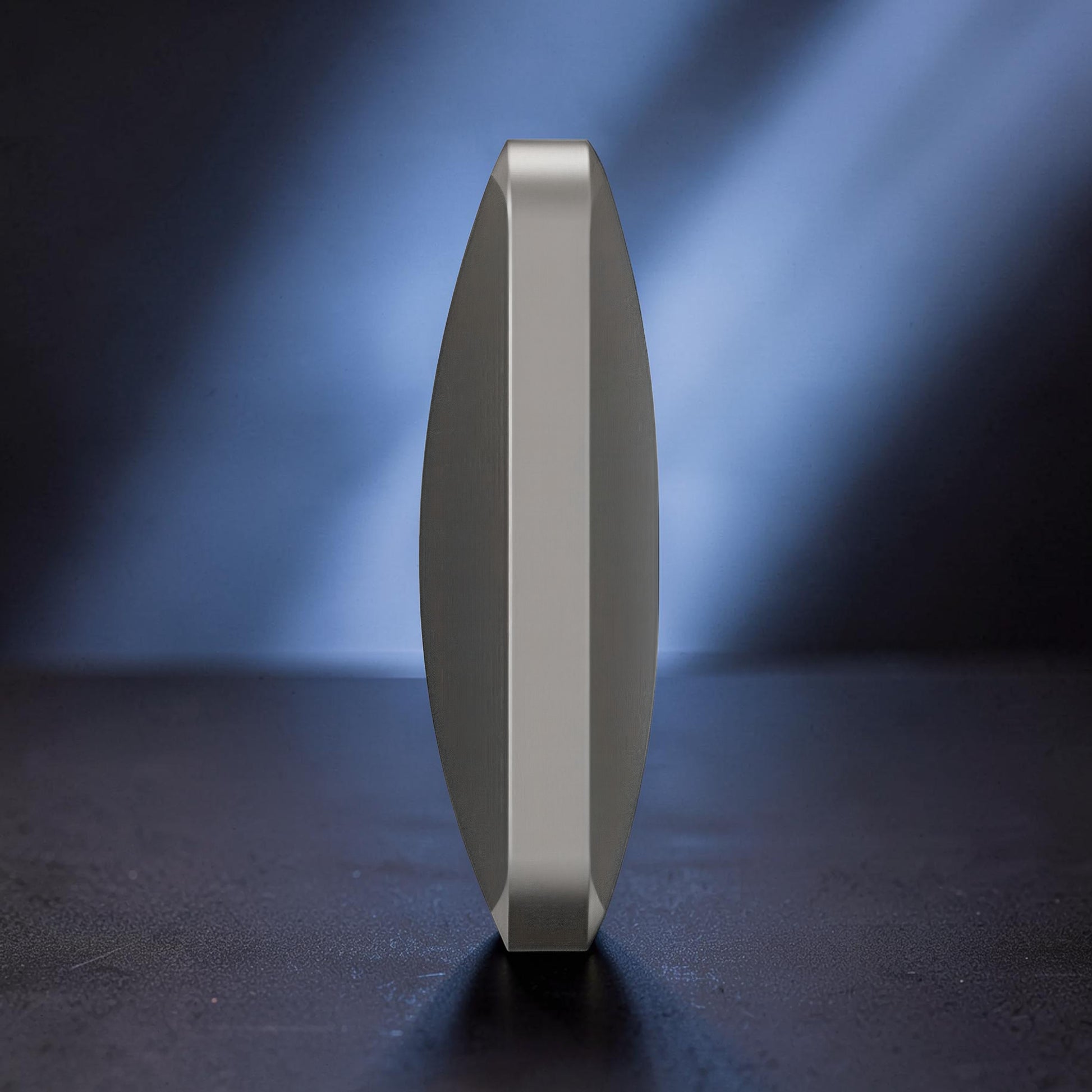 The Curious Mind Flipo Flip Square Desk Spinner, premium brushed aluminum kinetic sculpture with faceted design for focus and stress relief.