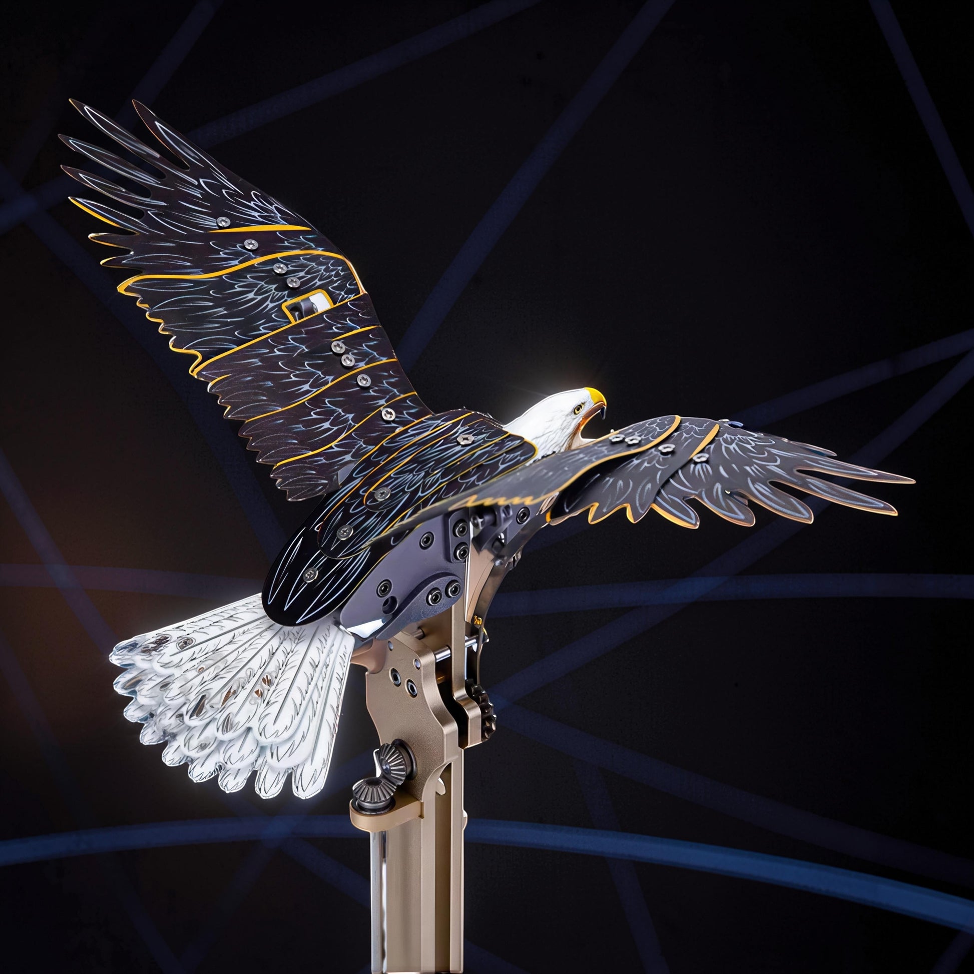 The Curious Mind Bald Eagle Flapping Wings DIY Kit, a metal mechanical model with intricate details and gold accents.
