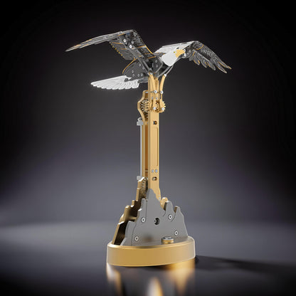 The Curious Mind Bald Eagle mechanical model kit with flapping wings, made of metal, featuring intricate gears and a gold base.
