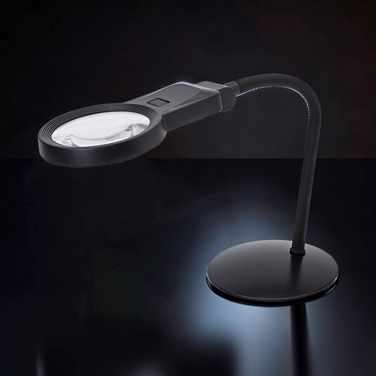 The Curious Mind black gooseneck LED magnifier desk lamp with adjustable neck for hobby work, electronics, and repairs.
