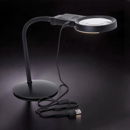 The Curious Mind black gooseneck LED magnifier desk lamp with adjustable neck for hobby work.