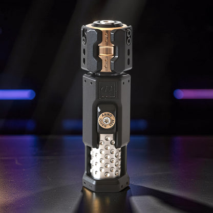 The Curious Mind Musketeers Snap Coin Clicker fidget toy, black metal with gold accents and a textured silver base.