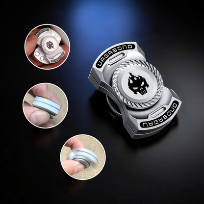 The Curious Mind Butterfly Plus Metal Spinner in black features a skull and flames design. Smooth spinning action for EDC.