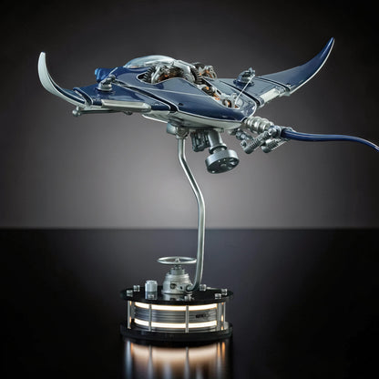 The Curious Mind blue metal manta ray mechanical ocean creature DIY kit on display stand.