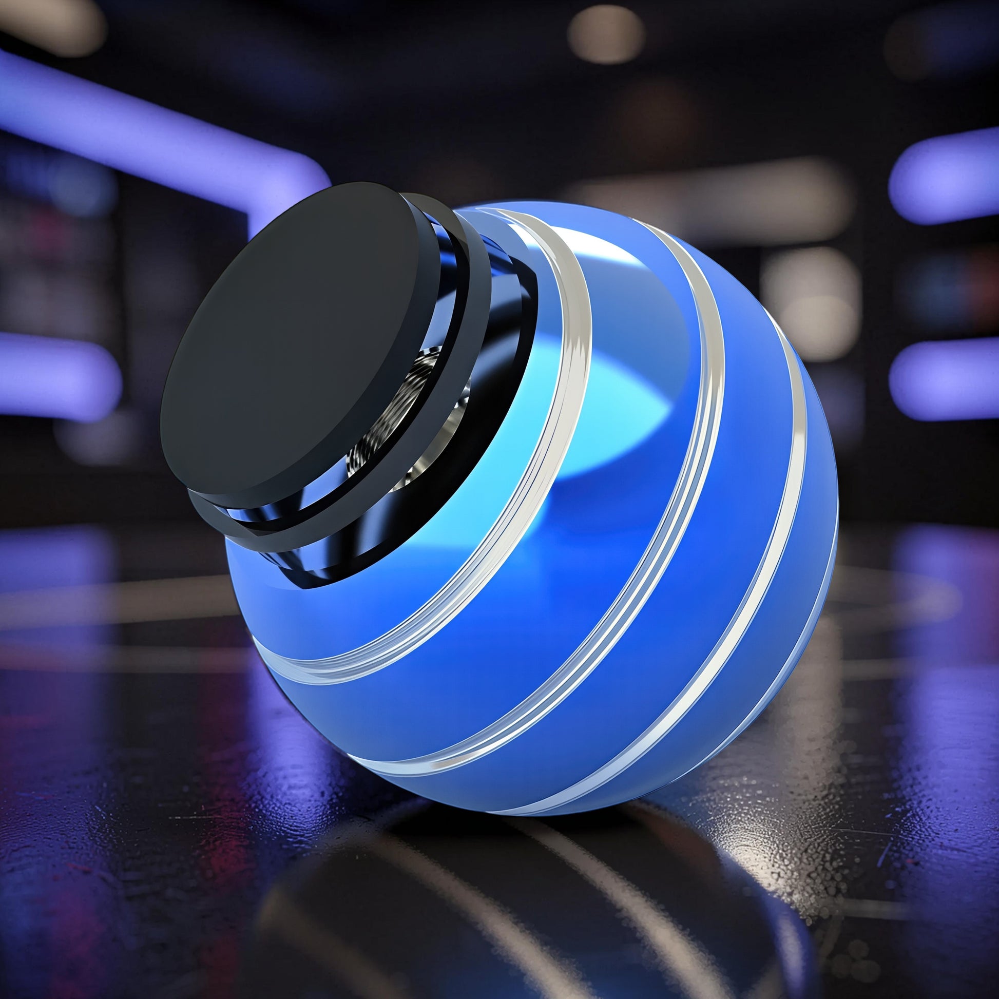 The Curious Mind blue metal desktop stress ball with silver stripes and black top, designed for fidgeting and stress relief.