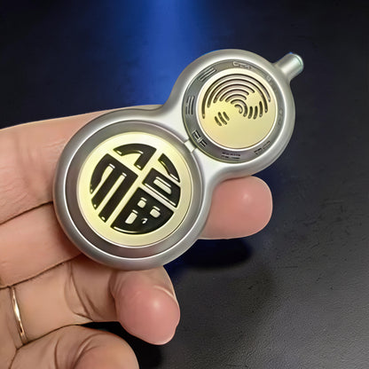 The Curious Mind Cucurbit Gourd Spinner, a premium metal EDC fidget toy with a dual-lobed design featuring Chinese characters and a fingerprint-like pattern.
