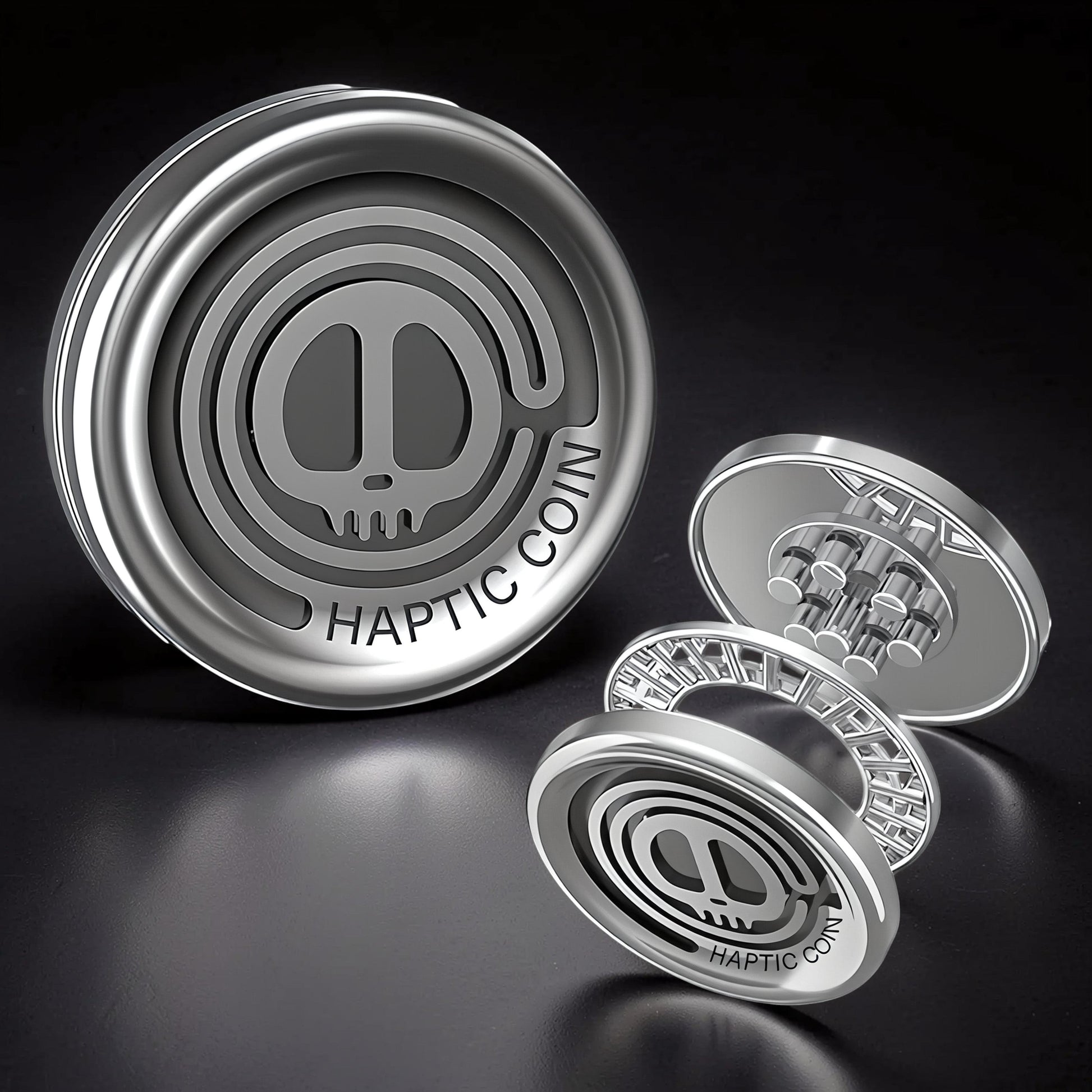 The Curious Mind Demon Coin Push Card Clicker fidget toy. Silver metal coin with skull logo and HAPTIC COIN text. Compact and tactile.