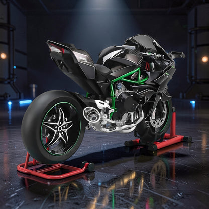 The Curious Mind 1/6 diecast motorcycle model in black with green accents, displayed on a red stand.