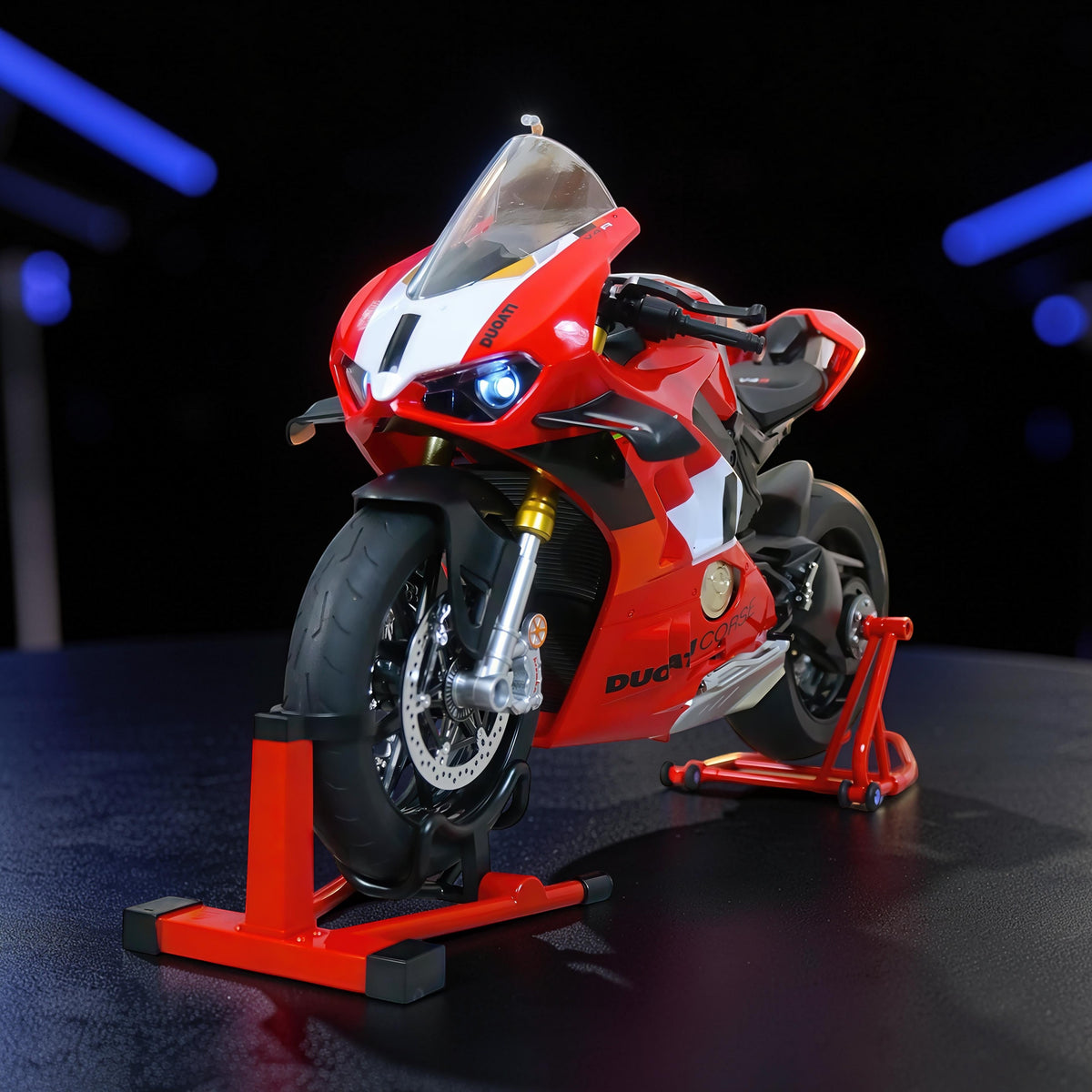 The Curious Mind 1/6 scale diecast model motorcycle, red and white with black accents, displayed on a red stand.