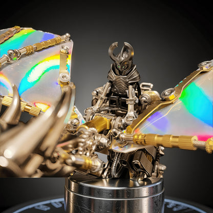 The Curious Mind Dragon with iridescent wings, a detailed metal model kit with steampunk elements and a display base.