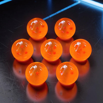 The Curious Mind Dragon Ball Crystal Ball Figure, orange resin with embedded stars, 42mm diameter, collector gift display.