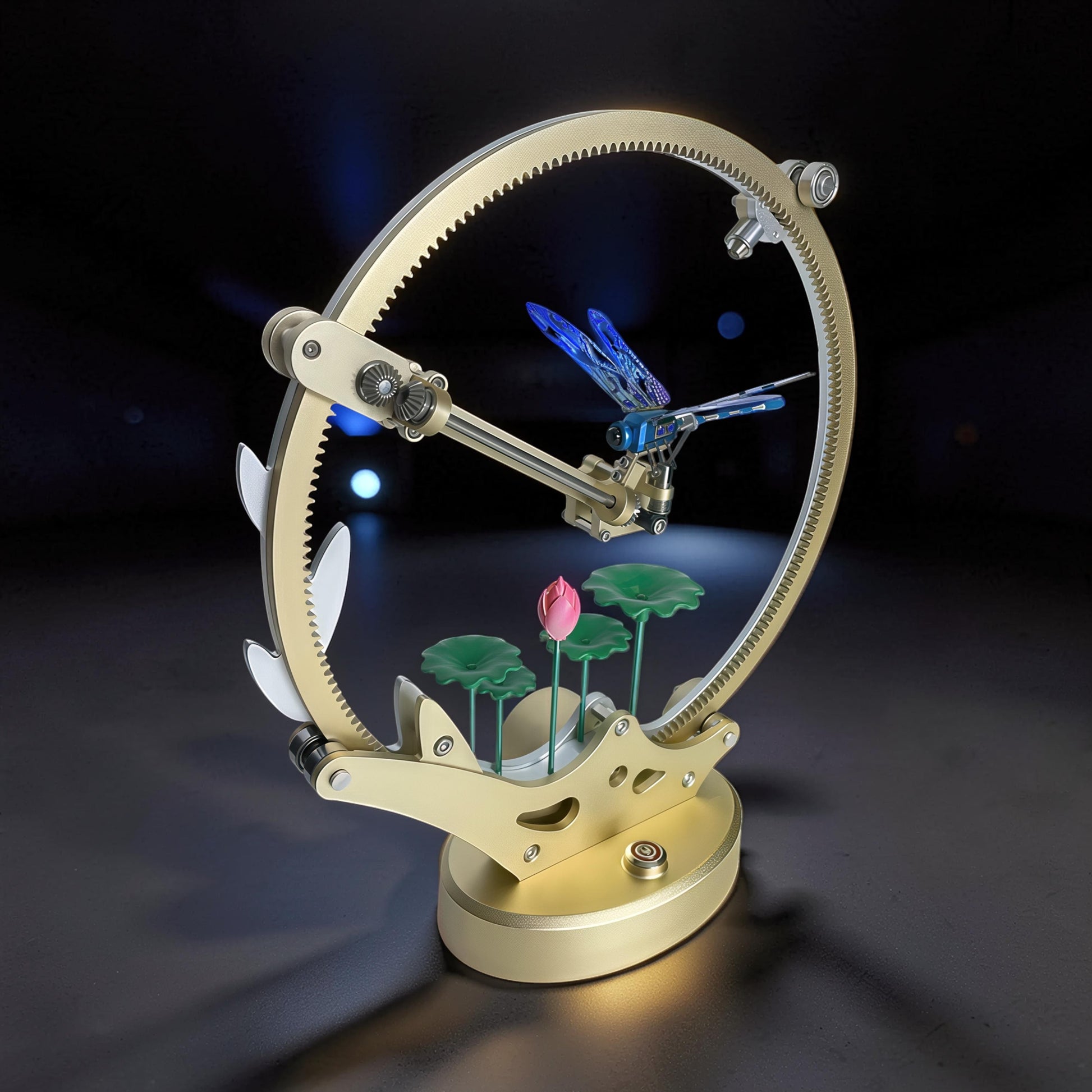 The Curious Mind Flying Dragonfly Kinetic DIY Kit, a mechanical metal model with blue wings and lotus flowers, 22x11.4x27.1cm.