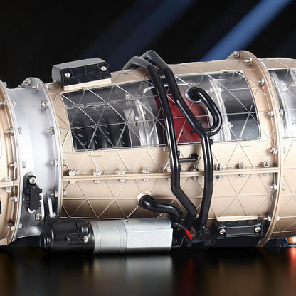 The Curious Mind Fighter Jet Turbofan DIY Kit, a detailed PLA model with gold, silver, and black accents, featuring clear panels and visible internal components.