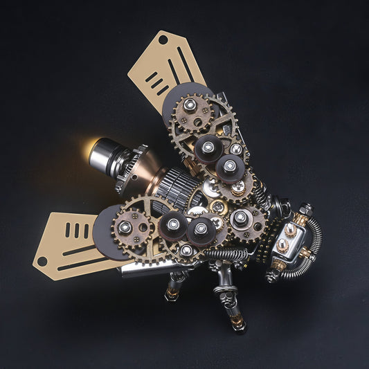 The Curious Mind Firefly 3D metal model kit, steampunk mechanical insect with gears, brass wings, and illuminated head.