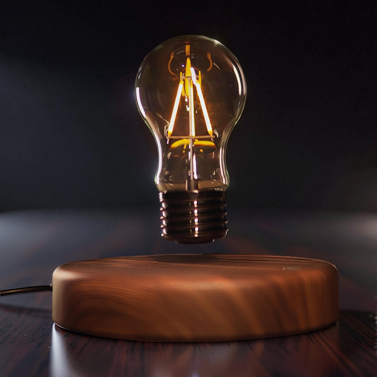 The Curious Mind's high-tech floating lightbulb ornament with a wood base and glass bulb, featuring an Edison-style filament.