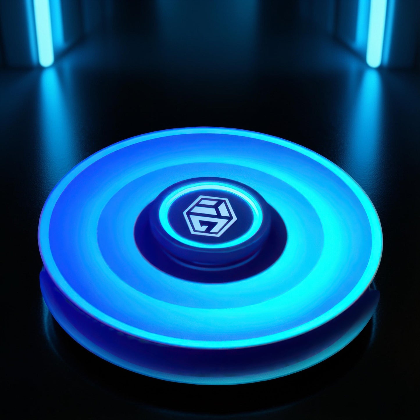 The Curious Mind Armoured Mech Glow Spinner features a futuristic metal design with blue LED glow strips and a central logo.