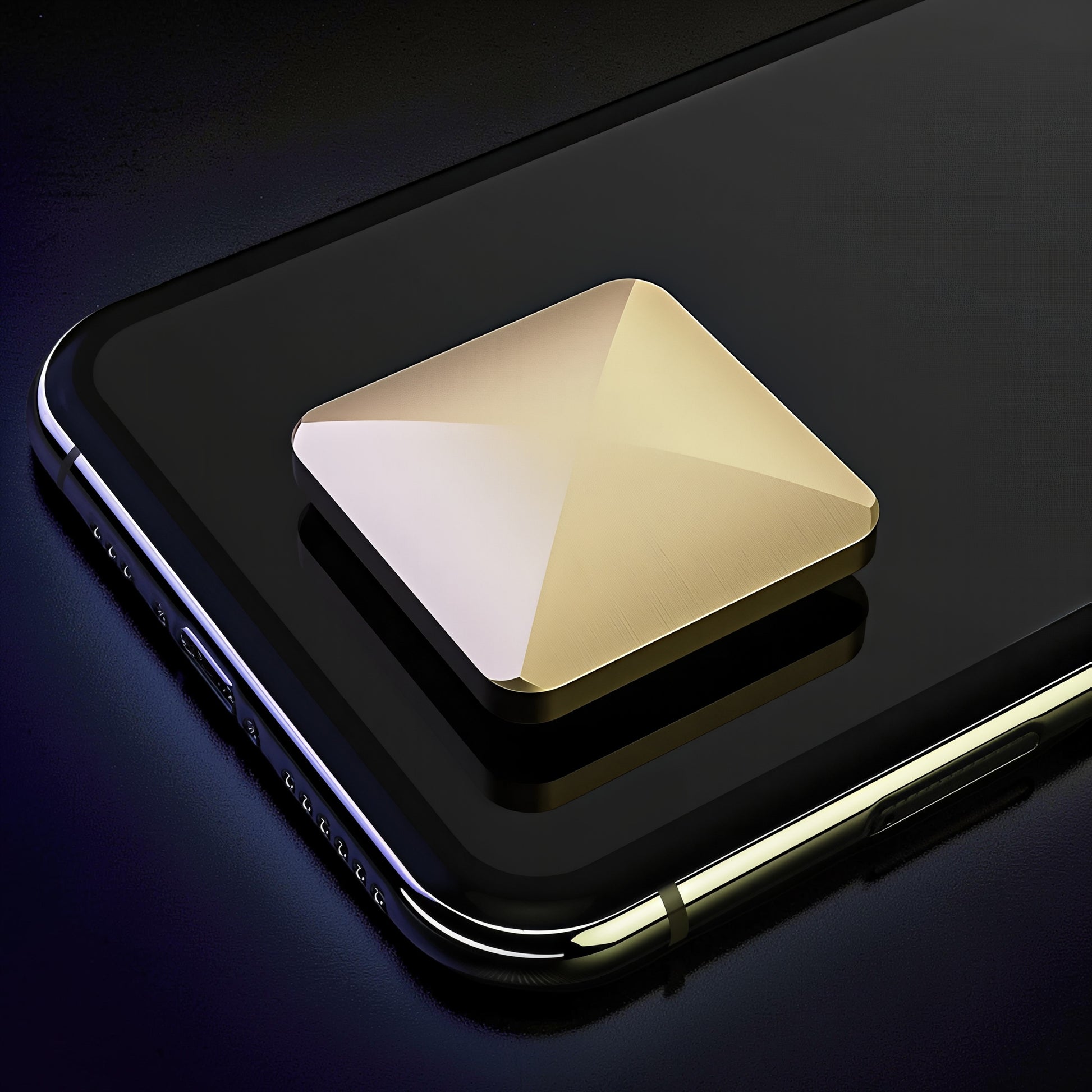 The Curious Mind Flipo Flip Square Desk Spinner, gold brushed aluminum kinetic sculpture with faceted design on a black surface.